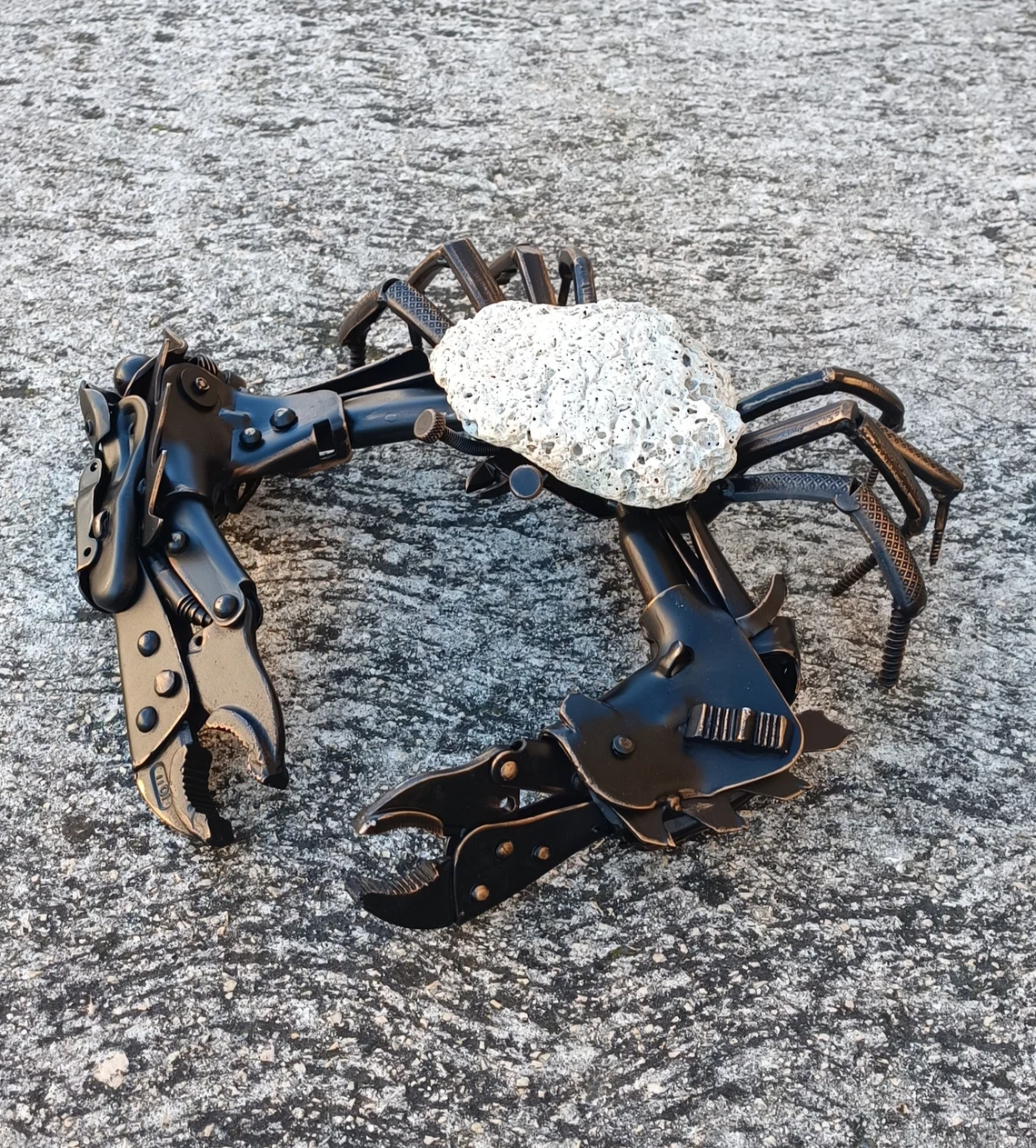 Metal and stone art crab sculpture